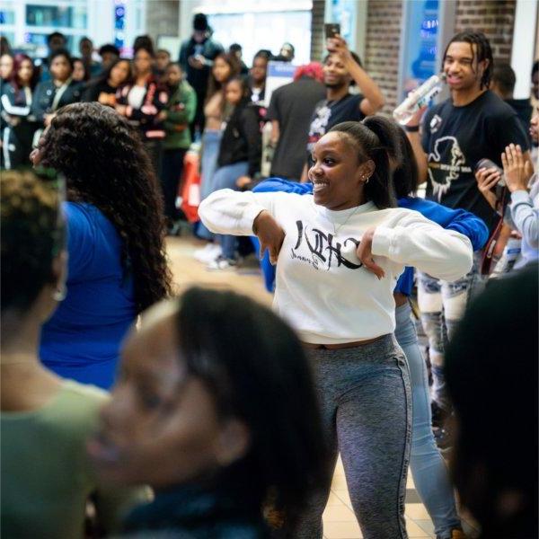 A group of students dances during Grand Valley's "The Blackout: Black Student Organization Showcase".